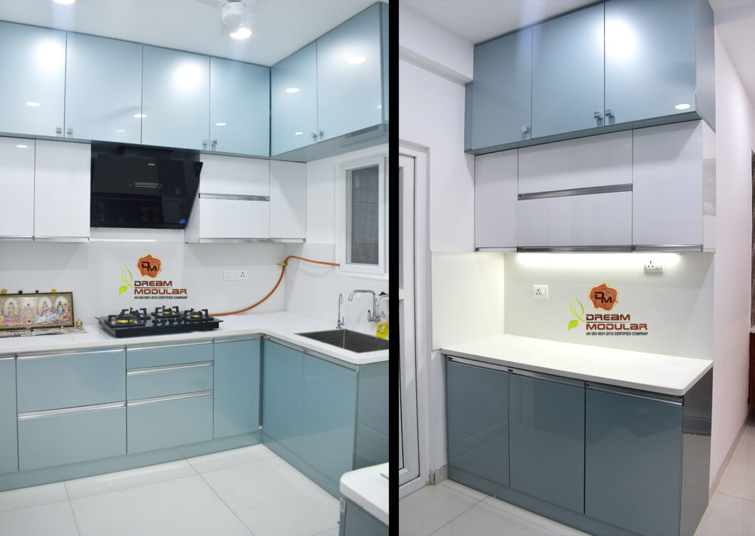 A Dream Modular kitchen with Lofts, Cabinets, Magic Corner, equipped with a stove and a microwave, designed to perfection by talented interior designers for your projects - Honer Aquantis - Tellapur - Dream Modular.