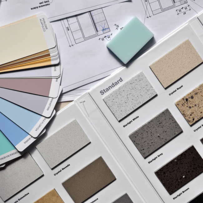 A collection of color swatches on a table, curated by an experienced interior design firm-Dream-Modular